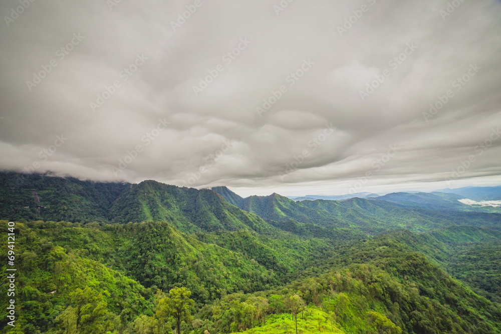 stormy clouds over mountain and Rain forest
