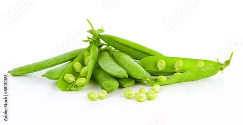 Fresh green peas isolated over white