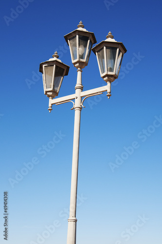 Lamp Post Street Road over blue sky