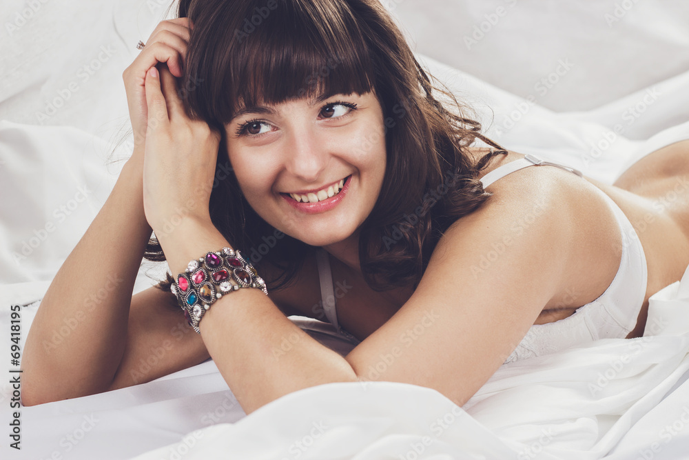 beautiful brunette girl in her bed beautiful brunette girl in her bed