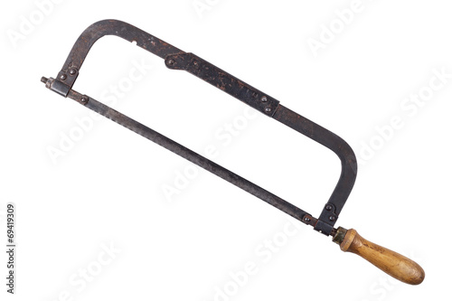 old rusty hacksaw isolated on the white
