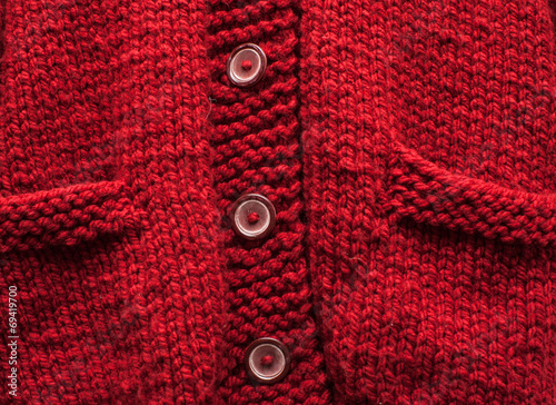 red knitted cardigan background