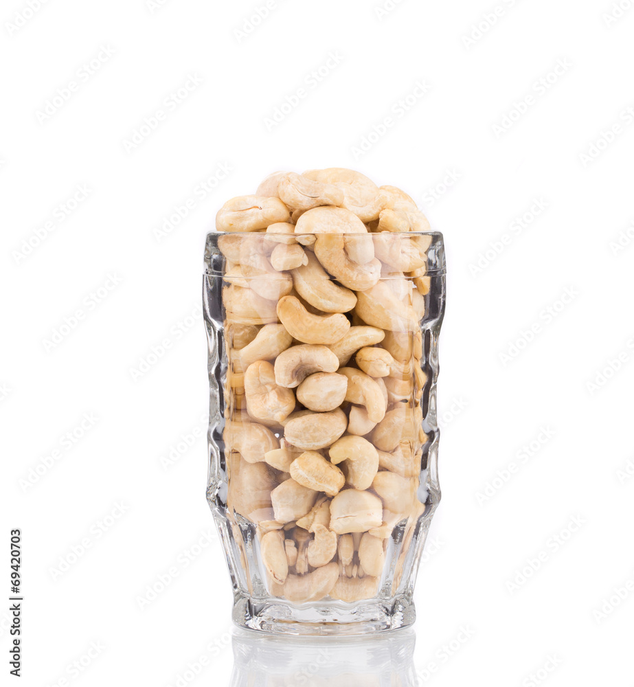 Glass full of tasty cashew nuts. Glass full of tasty cashew nuts.