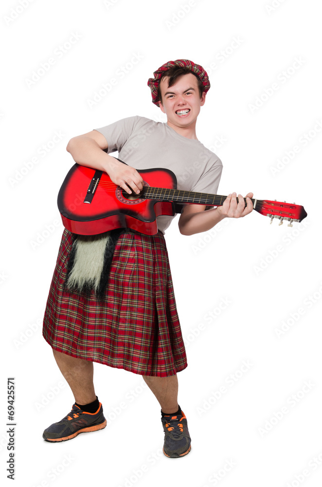 Scotsman playing guitar isolated on white