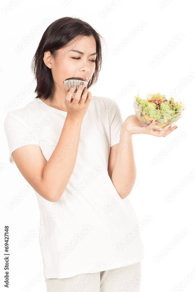 Pretty girl eating fresh vegetable salad Pretty girl eating fresh vegetable salad