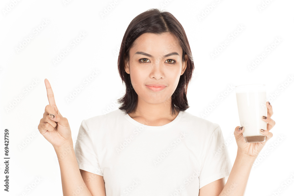 Laughing young woman with a glass of milk Laughing young woman with a glass of milk