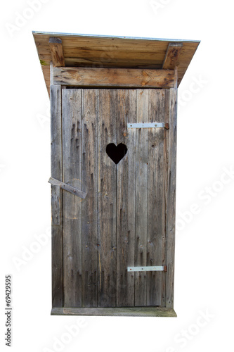 Foto Small wooden outdoors toilet isolated on white