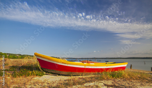 boats in the water of Foz do Arelho, Portugal photo