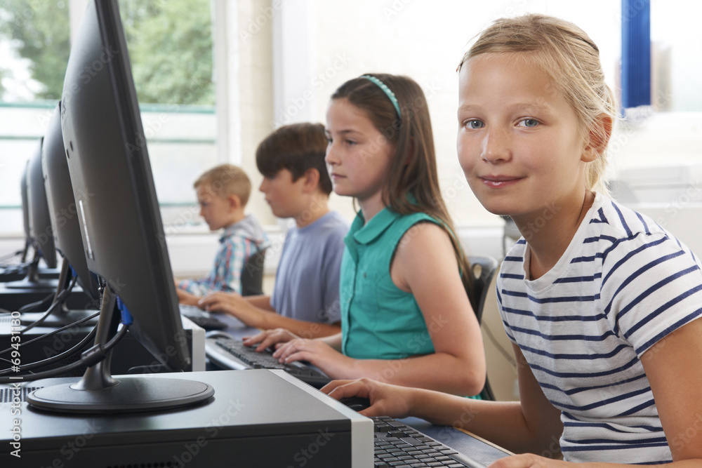 Group Of Elementary School Children In Computer Class Group Of Elementary School Children In Computer Class