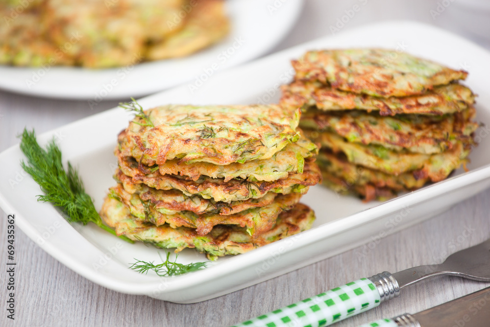 Green pancakes with zucchini and herbs