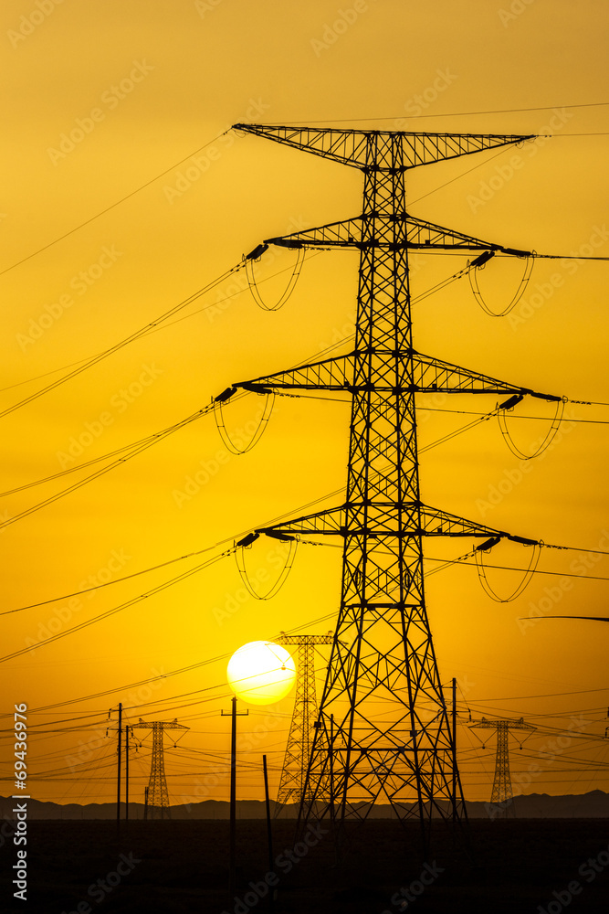 Fototapeta premium sunset over a windfarm