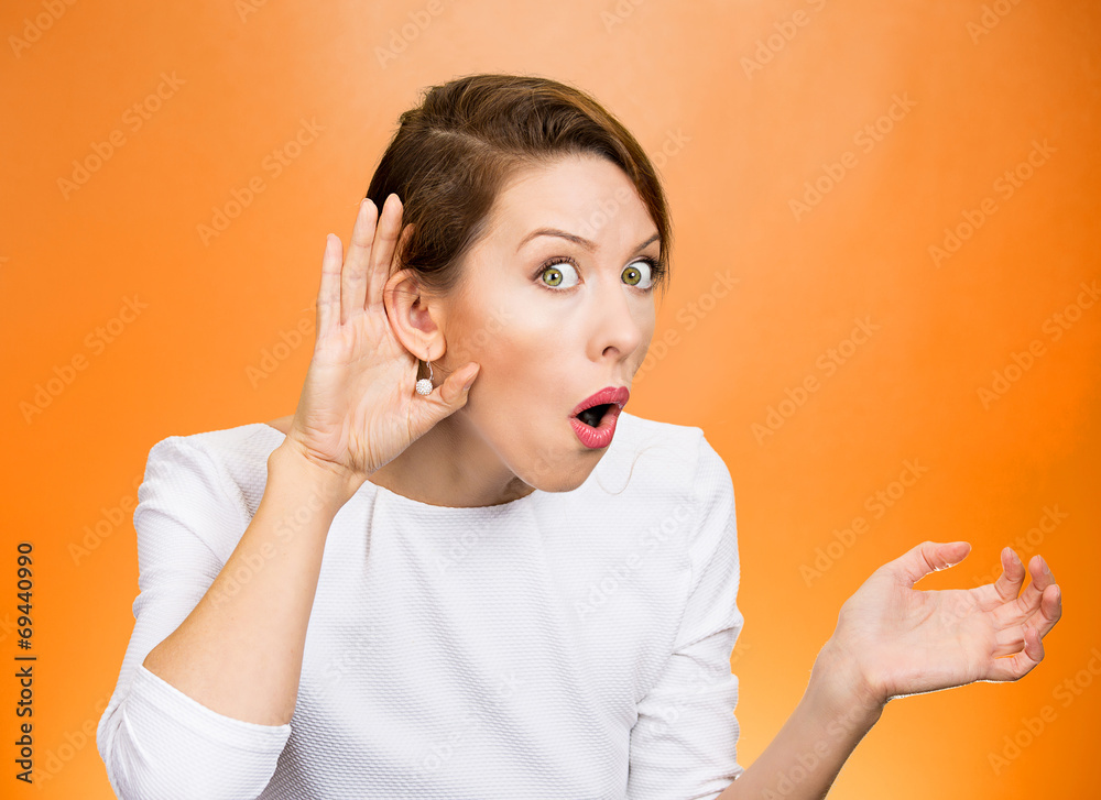 Nosy surprised woman hand to ear gesture, carefully listens Nosy surprised woman hand to ear gesture, carefully listens