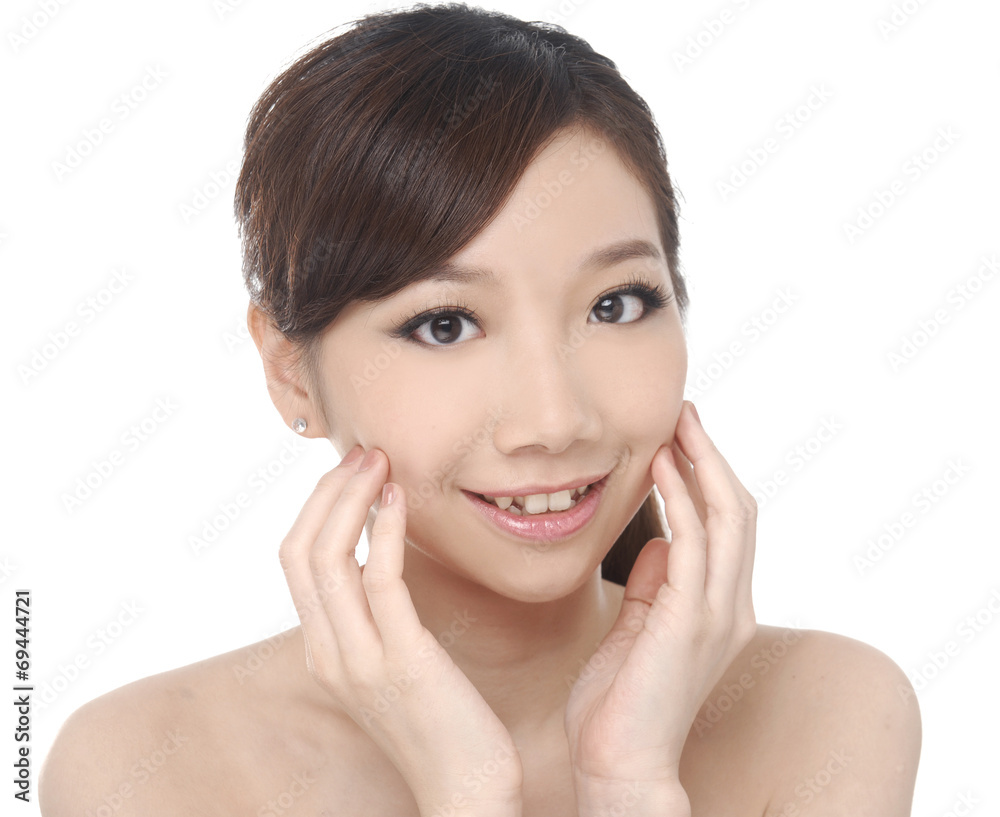 Pretty female face of a beauty asian over white background