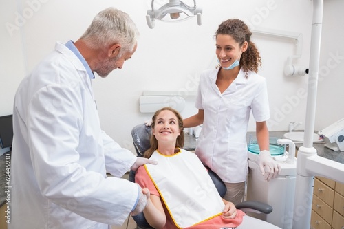 Dentist shaking hands with his patient in the chair © WavebreakmediaMicro