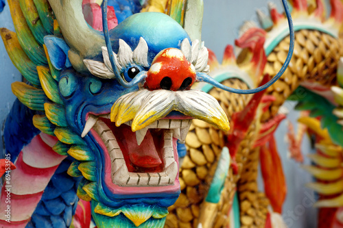 China Dragon Sculpture at Chinese Temple © dangdumrong