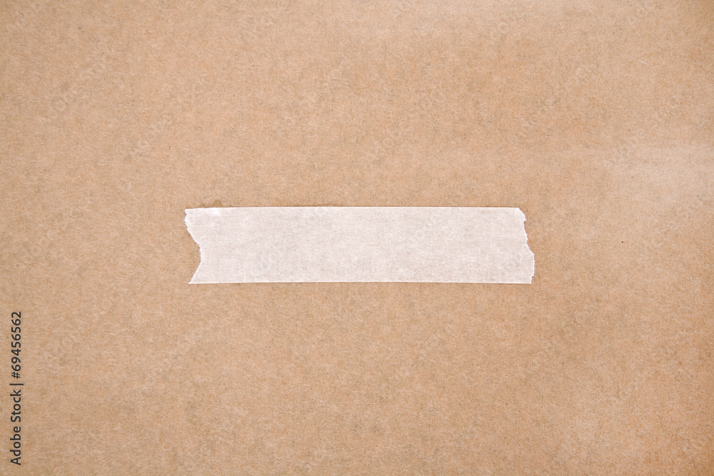 Adhesive tape on brown paper