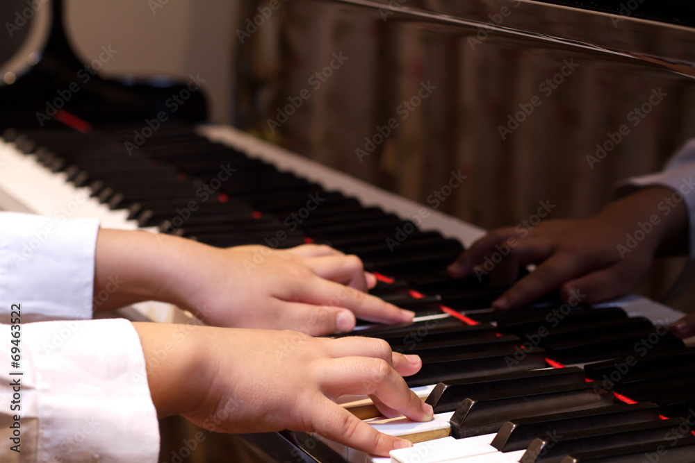 Obraz premium Playing a Piano