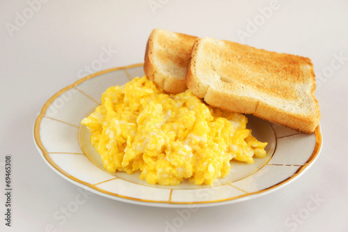 Breakfast with scrambled eggs and  toast
