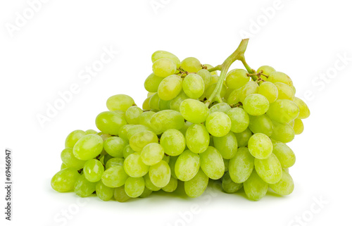 bunch of ripe and juicy green grapes on a white background
