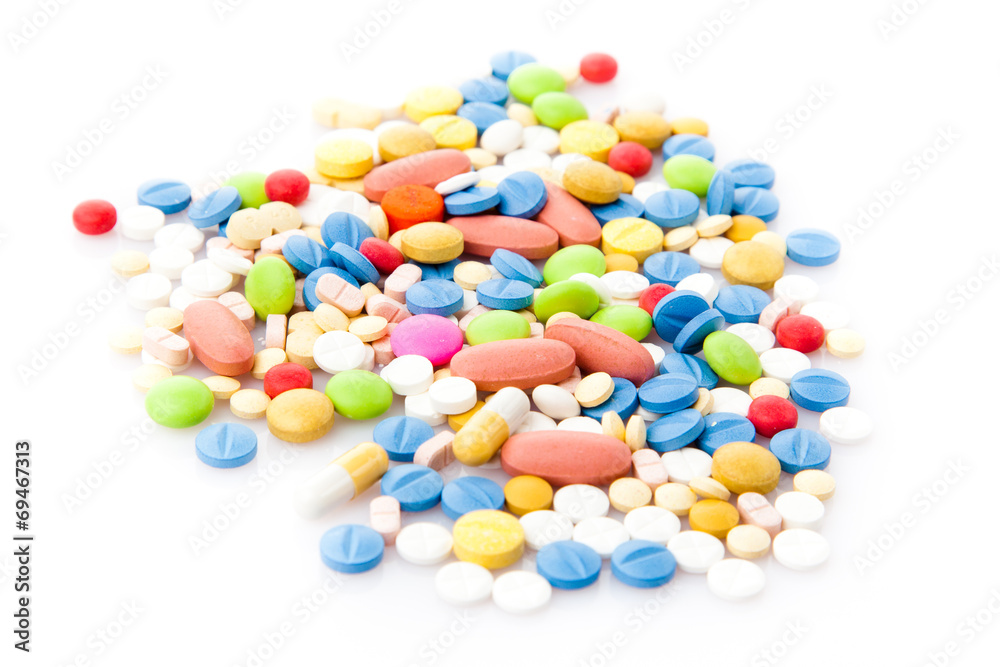 colorful pills isolated on white colorful pills isolated on white