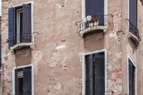 Rustic windows on european old homes © jearlwebb
