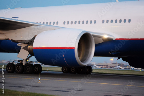 Passenger planes at the airport in the evening