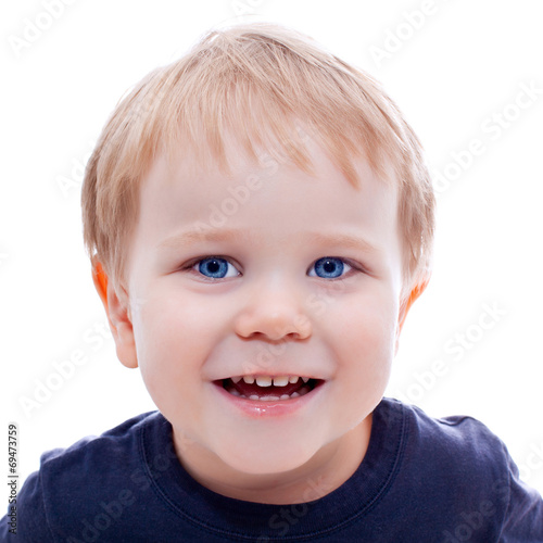 Toddler blond and blue eyes boy child with various facial expres