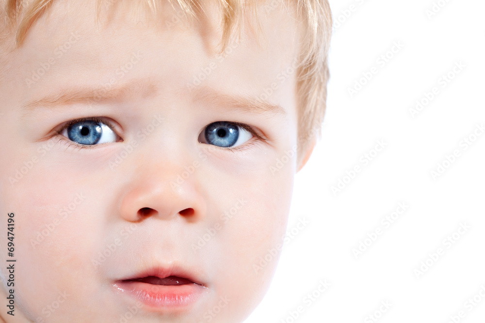 Toddler blond and blue eyes boy child with various facial expres Toddler blond and blue eyes boy child with various facial expres