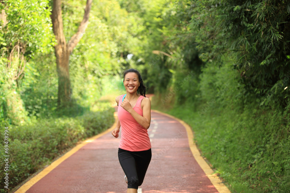 fitness woman runner running on trail fitness woman runner running on trail