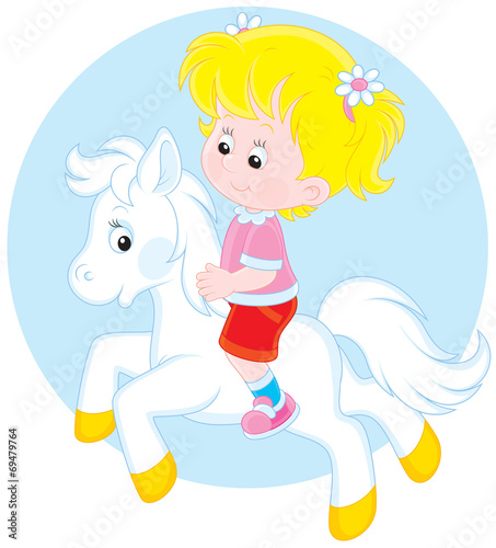 Girl riding a white pony