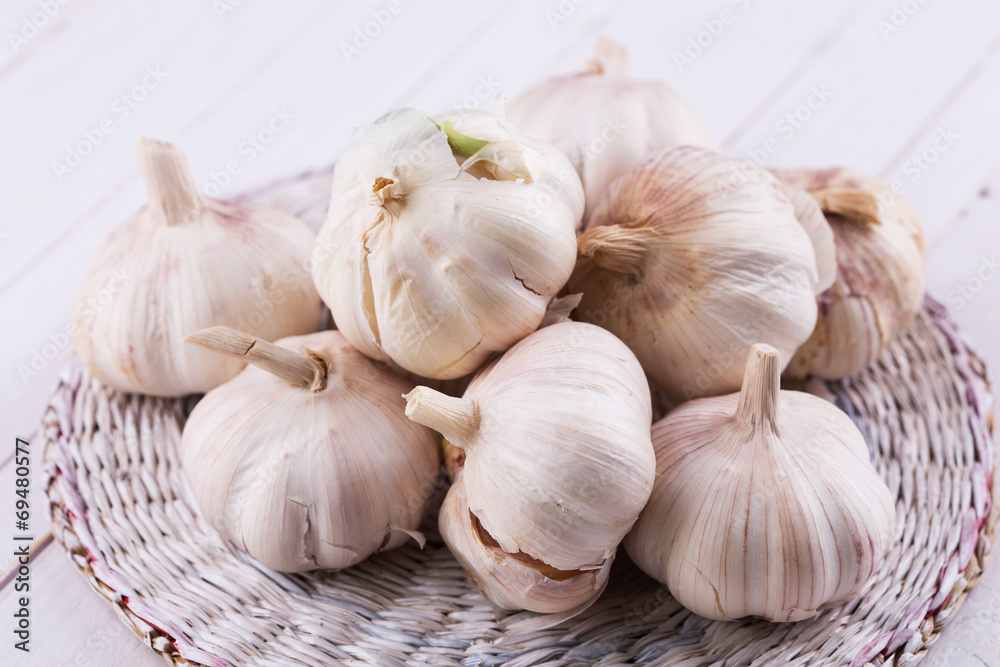 Garlic on wooden background Garlic on wooden background