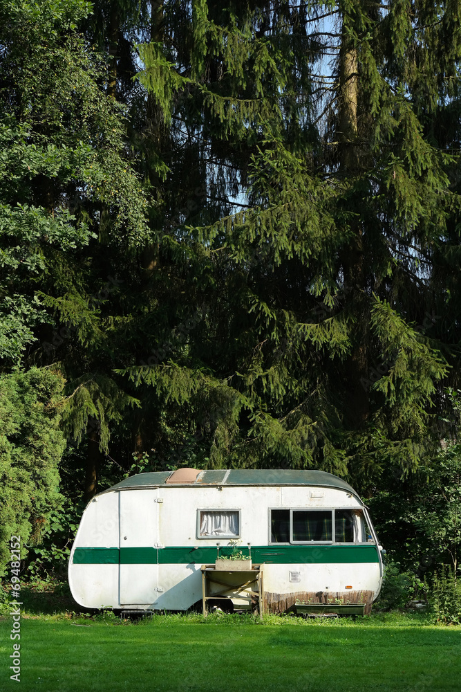 Naklejka premium An outmoded travel trailer in the Belgian Ardennes