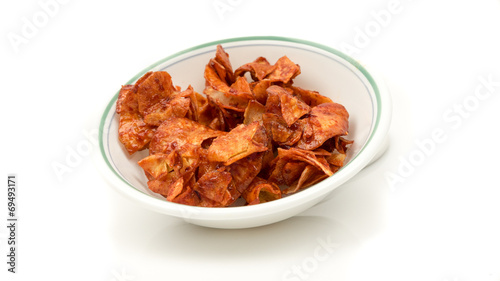 Bowl of Spicy Cassava Crisps or Kerepek Ubi Kayu Pedas photo