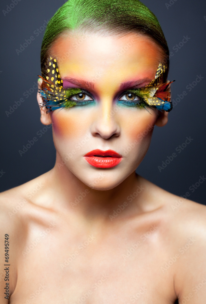 Woman with false feather eyelashes makeup Woman with false feather eyelashes makeup