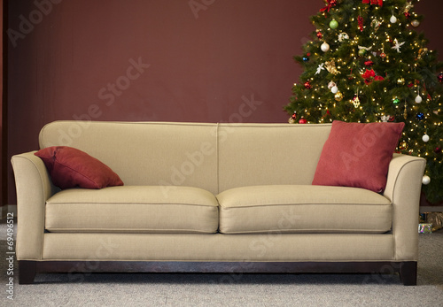 Empty Couch with Christmas Tree