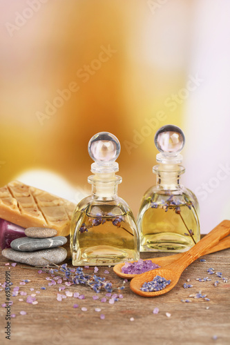 Fototapeta Naklejka Na Ścianę i Meble -  Spa still life with lavender oil and flowers