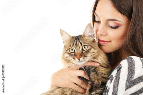 Beautiful young woman holding cat isolated on white