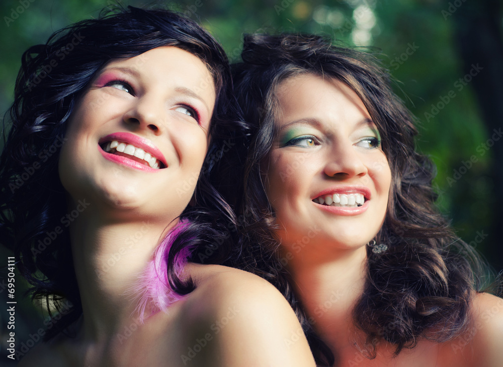 Portrait of two happy teenage girlfriends Portrait of two happy teenage girlfriends