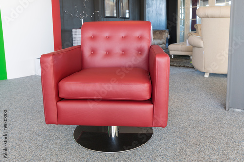 Showroom modern furniture shop with luxury red leather armchair © Kruwt