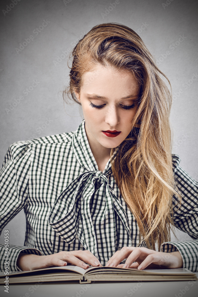 beautiful young woman who is reading a book beautiful young woman who is reading a book