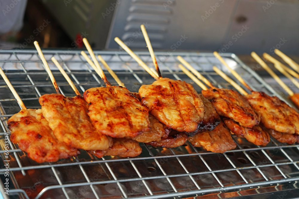 grilled pork with stick on stainless mesh