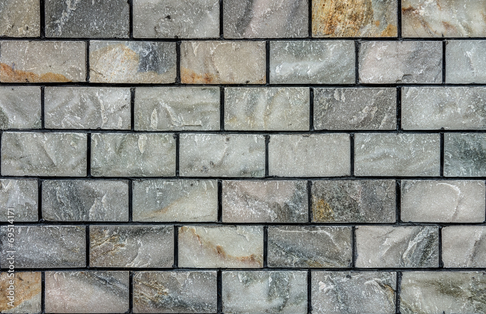 Natural marble stone brick wall for background and texture Natural marble stone brick wall for background and texture
