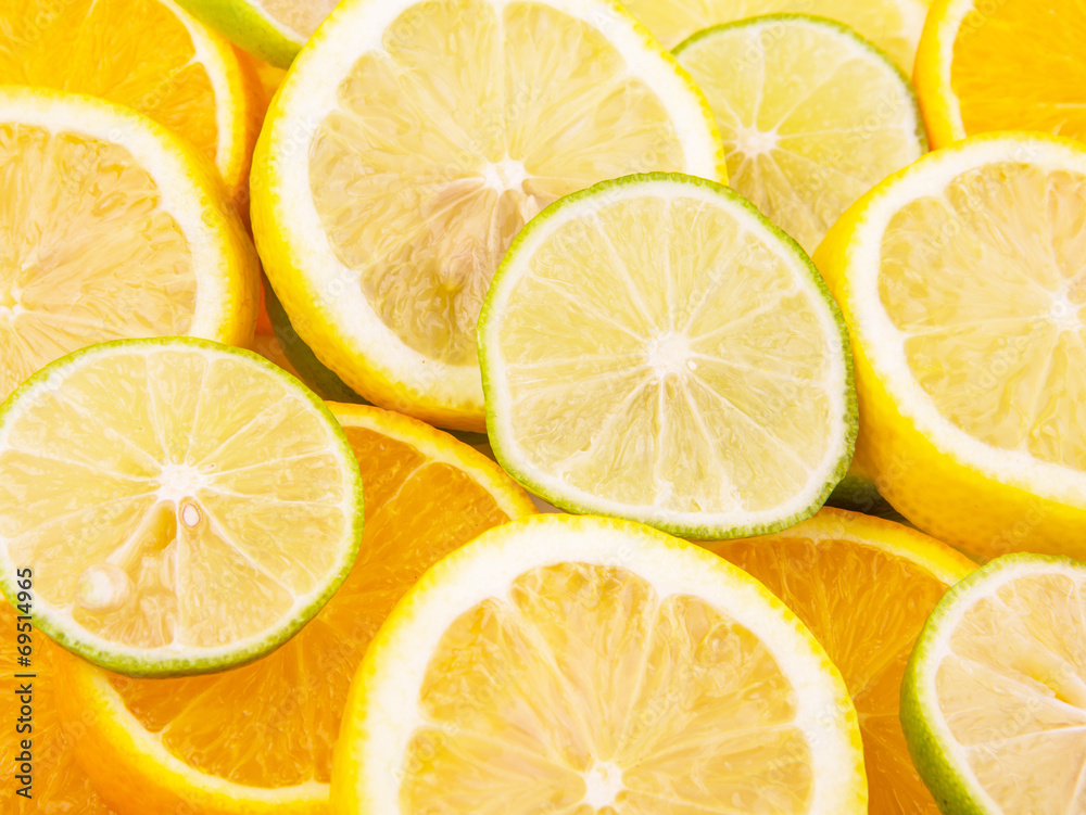 Slices of lemon, lime and orange close up view