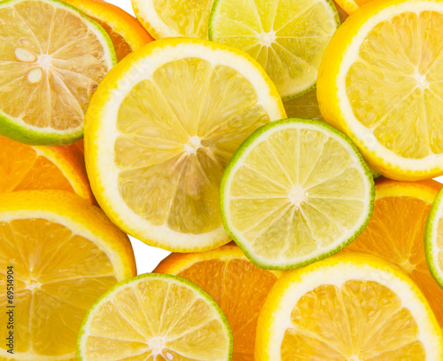 Slices of lemon, lime and orange close up view