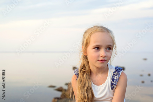 Portrait of little girl on sunset © Canvas Alchemy