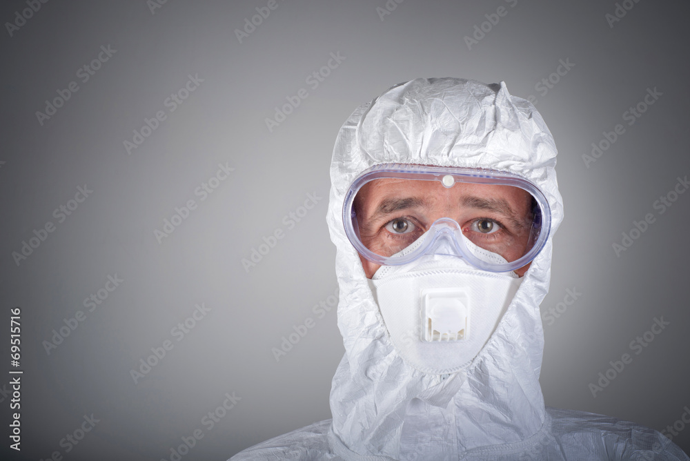 Scientist in protective wear, glasses, respirator Scientist in protective wear, glasses, respirator