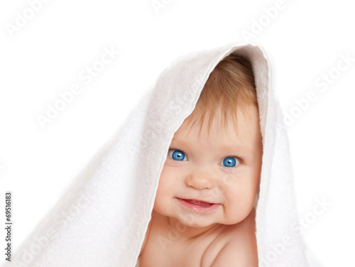 happy smiling baby with towel on head