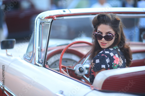 Lovely Woman Posing and and Around a Vintage Car © Katrina Brown