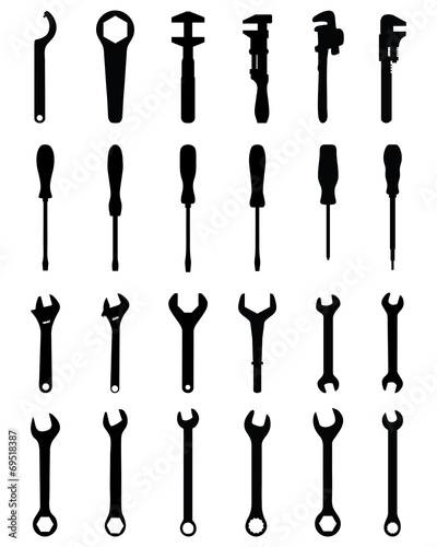 Black silhouettes of screw wrench and screwdrivers, vector