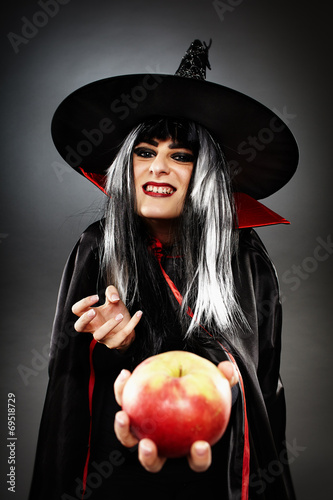 Sorcerer offering a poisoned apple